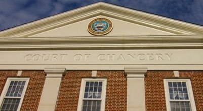 Front facade of the Delaware Court of Chancery, the premier venue for high-stakes corporate litigation – trusted by business litigation lawyers and corporate litigators handling fiduciary duty, shareholder, and contract disputes.